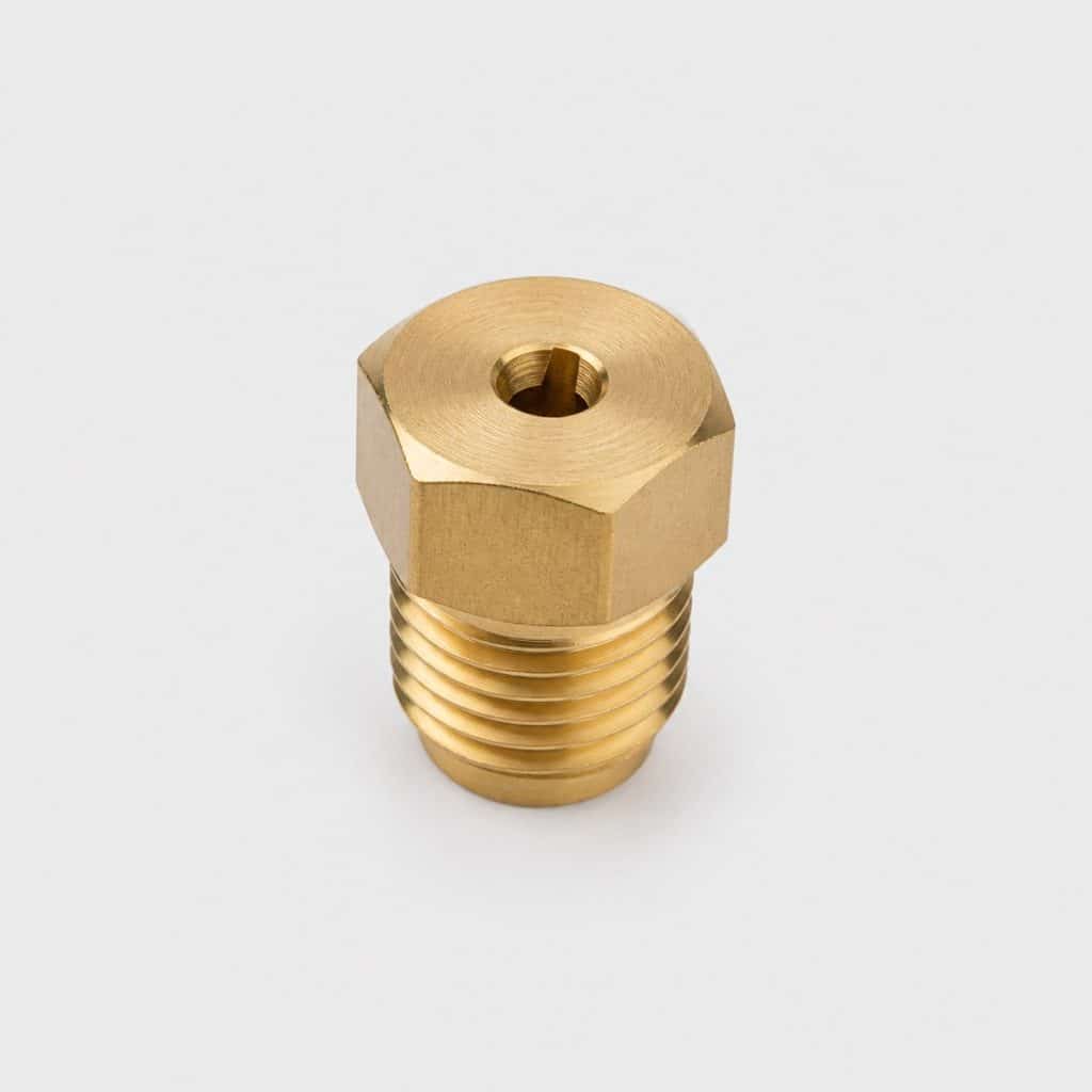 Gicleur calibre en laiton sur fond clair