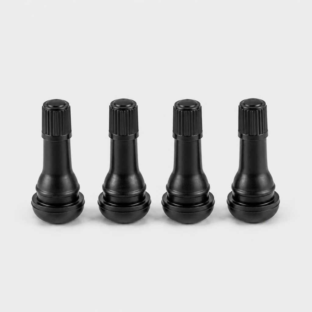 Quatre valves de roue pour moto sur fond clair